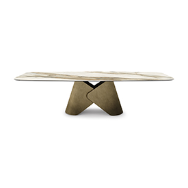 Scott Keramik table de Cattelan Italia allie design sculptural et élégance italienne, avec son plateau en céramique effet marbre et sa base métallique raffinée. Disponible chez D-Style Interior.