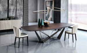 Skorpio Wood table design haut de gamme et acier laqué par Cattelan Italia, alliance parfaite entre force sculpturale et élégance naturelle. Disponible chez D-Style Interior.