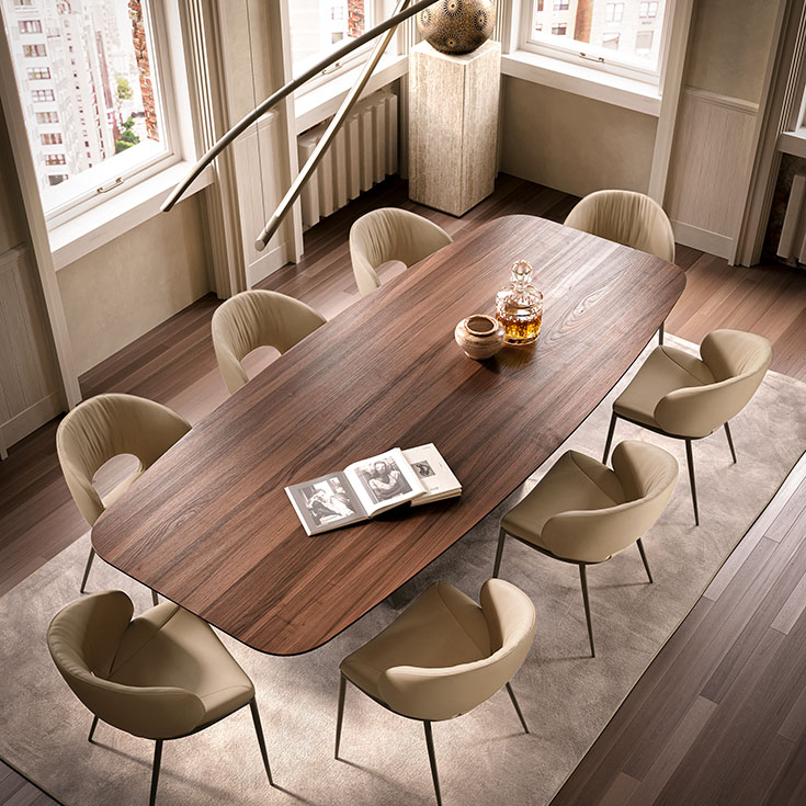 Skorpio Wood table design haut de gamme et acier laqué par Cattelan Italia, alliance parfaite entre force sculpturale et élégance naturelle. Disponible chez D-Style Interior.