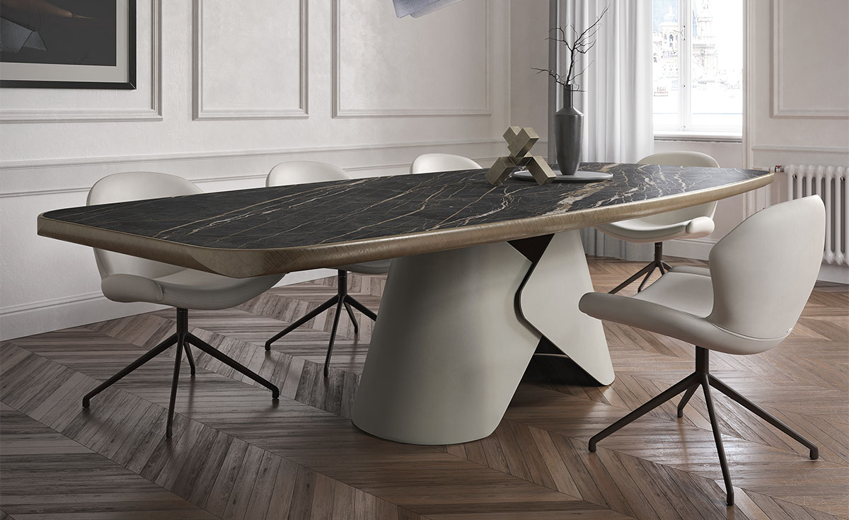 Scott Keramik Premium table de Cattelan Italia incarne la fusion entre sculpture et design, avec son plateau en céramique marbrée et sa base métallique élégante. Disponible chez D-Style Interior.