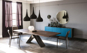 Premier Wood Drive table extensible en bois et acier laqué signée Cattelan Italia, alliant élégance naturelle, innovation et design contemporain. Disponible chez D-Style Interior.