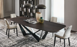 Skorpio Wood table design haut de gamme et acier laqué par Cattelan Italia, alliance parfaite entre force sculpturale et élégance naturelle. Disponible chez D-Style Interior.