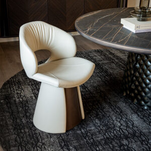 Dafne Chaise design de Cattelan Italia, au dossier ajouré et base conique raffinée, alliant élégance sculpturale et confort haut de gamme. Disponible chez D-Style Interior.