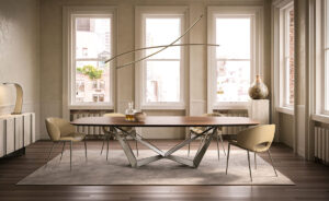 Skorpio Wood table design haut de gamme et acier laqué par Cattelan Italia, alliance parfaite entre force sculpturale et élégance naturelle. Disponible chez D-Style Interior.