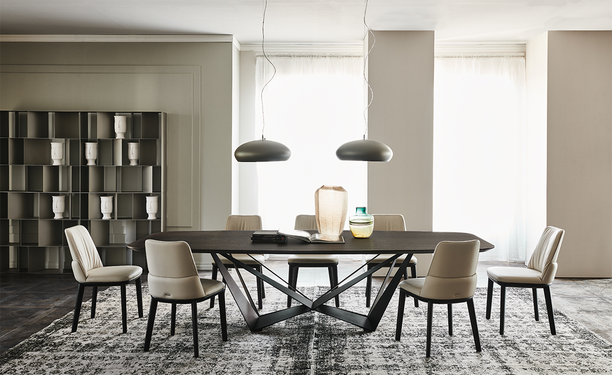 Skorpio Wood table design haut de gamme et acier laqué par Cattelan Italia, alliance parfaite entre force sculpturale et élégance naturelle. Disponible chez D-Style Interior.