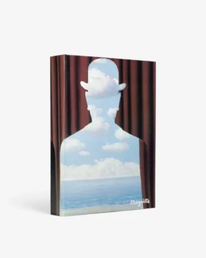 Livre design haut de gamme René Magritte sous étui par Assouline, disponible chez D-Style Interior.