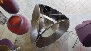 Table à manger design haut de gamme Oracle par Arketipo, base trois cercles métalliques avec plateau marbre, disponible chez D-Style Interior