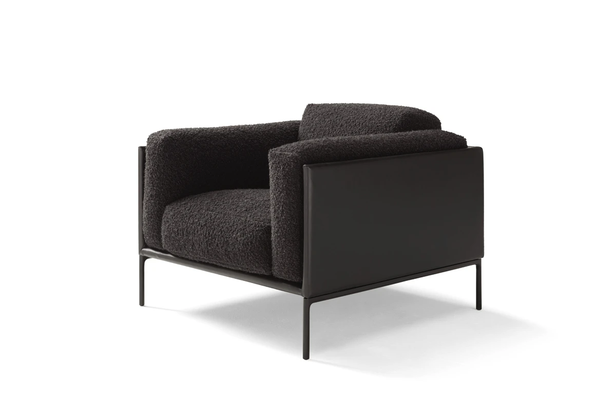 Giorgio fauteuil d’Amura Lab marie structure moderne et confort absolu dans une élégance italienne intemporelle. Disponible chez D-Style Interior.