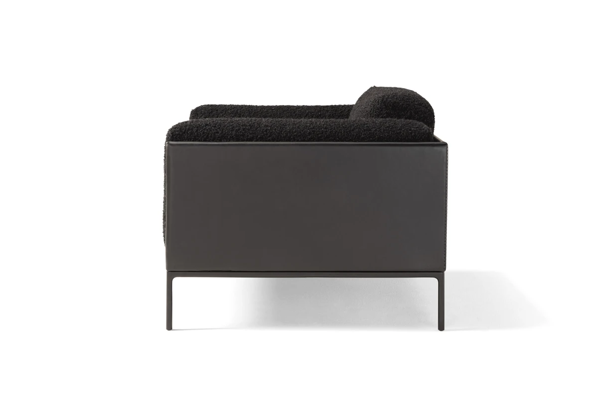 Giorgio fauteuil d’Amura Lab marie structure moderne et confort absolu dans une élégance italienne intemporelle. Disponible chez D-Style Interior.