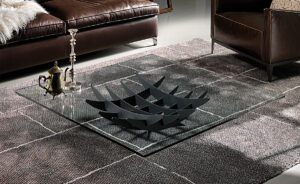 Table basse design haut de gamme Atlas par Cattelan Italia, plateau verre avec base acier méridiens, disponible chez D-Style Interior.