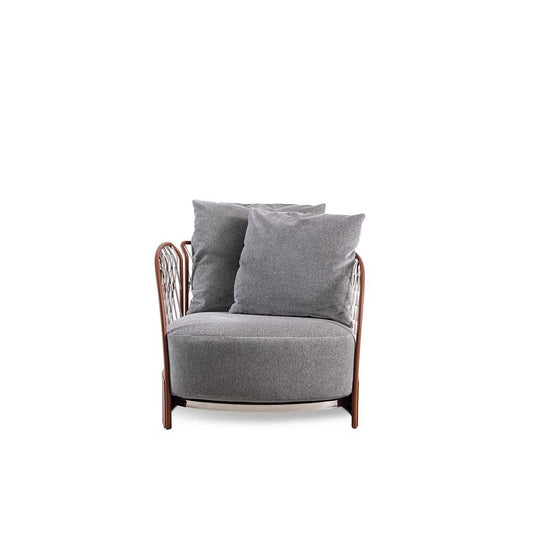 Solstice | Fauteuil design haut de gamme Bentley Home en acier inoxydable poli, cuir ou tissu d’extérieur, finitions Rust ou Deep Forest, disponible chez D-Style Interior