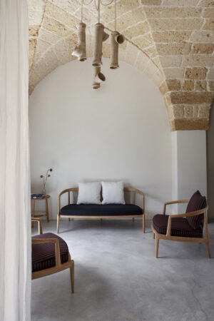 Canapé design haut de gamme The Secret Garden par Poltrona Frau, structure teck massif avec tissage bicolore, disponible chez D-Style Interior