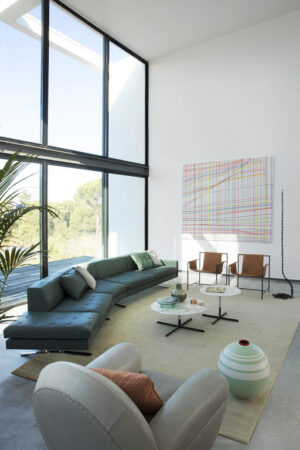 Canapé design haut de gamme Kennedee par Poltrona Frau, système modulable avec matelassage main motif X, disponible chez D-Style Interior