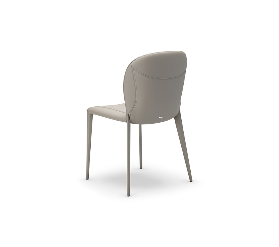 NANCY Chaise design entièrement rembourrée avec structure en acier et revêtement haut de gamme. Disponible chez D-Style Interior.