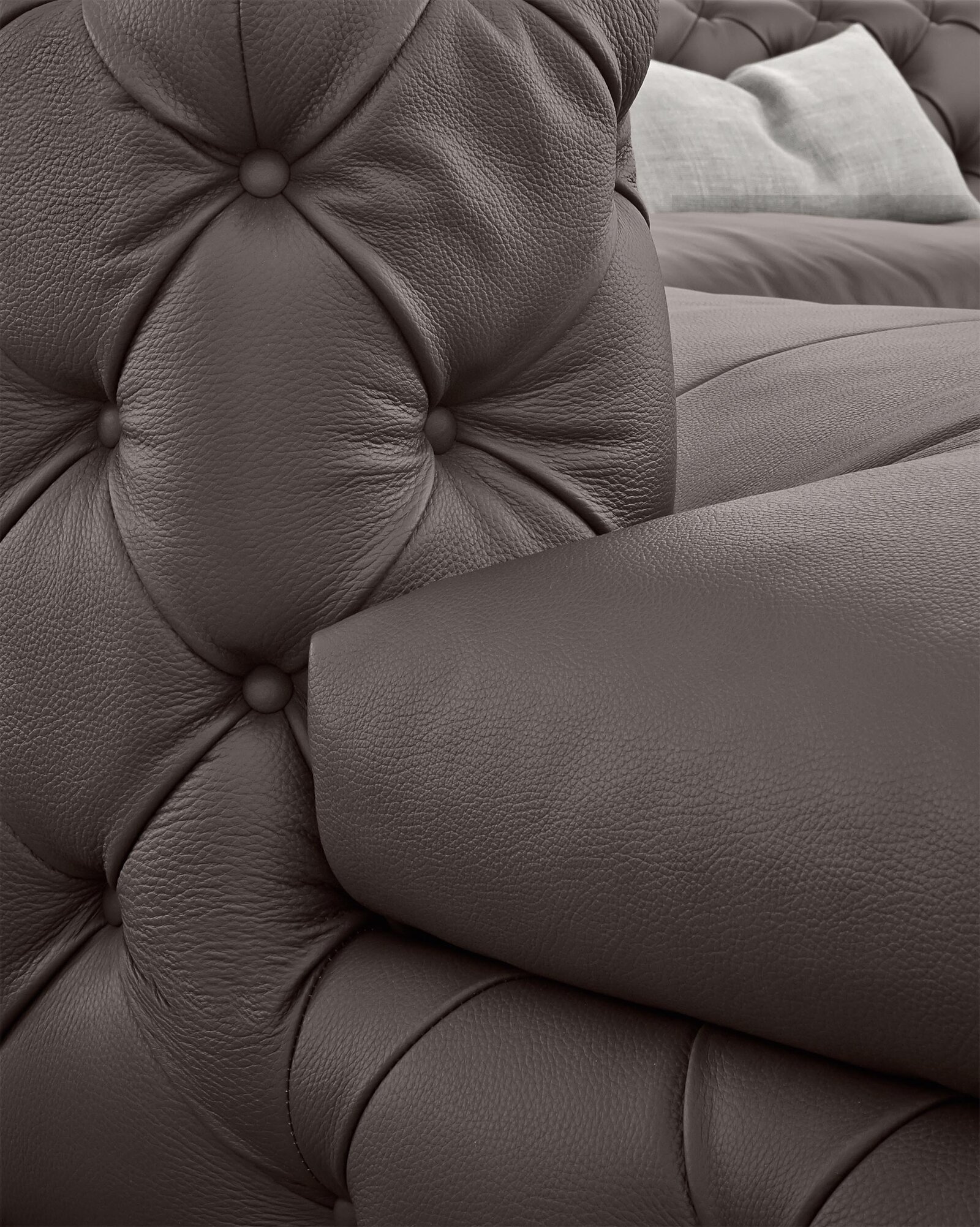 Aston canapé haut de gamme capitonné par Gamma Arredamenti, combinant style Chesterfield classique et confort contemporain. Disponible chez D-Style Interior.