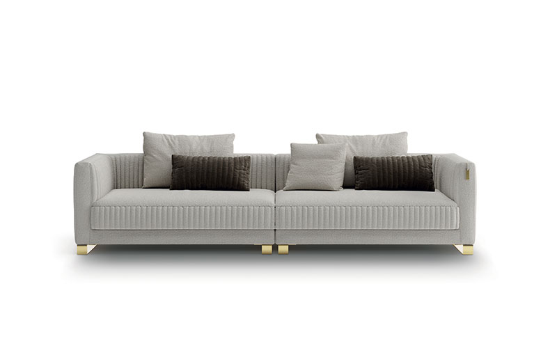 Brandolini canapé design haut de gamme par Vittoria Frigerio, avec surpiqûres verticales raffinées et finitions luxueuses. Disponible chez D-Style Interior.