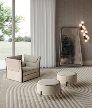 Araldo pouf de Vittoria Frigerio, alliance de textures nobles et de détails dorés. Élégance italienne disponible chez D-Style Interior.