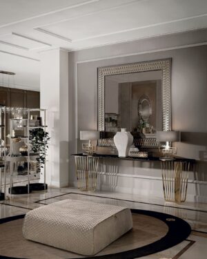 Alfieri console haut de gamme par Vittoria Frigerio avec base métallique sculpturale et plateau en marbre élégant. Disponible chez D-Style Interior.