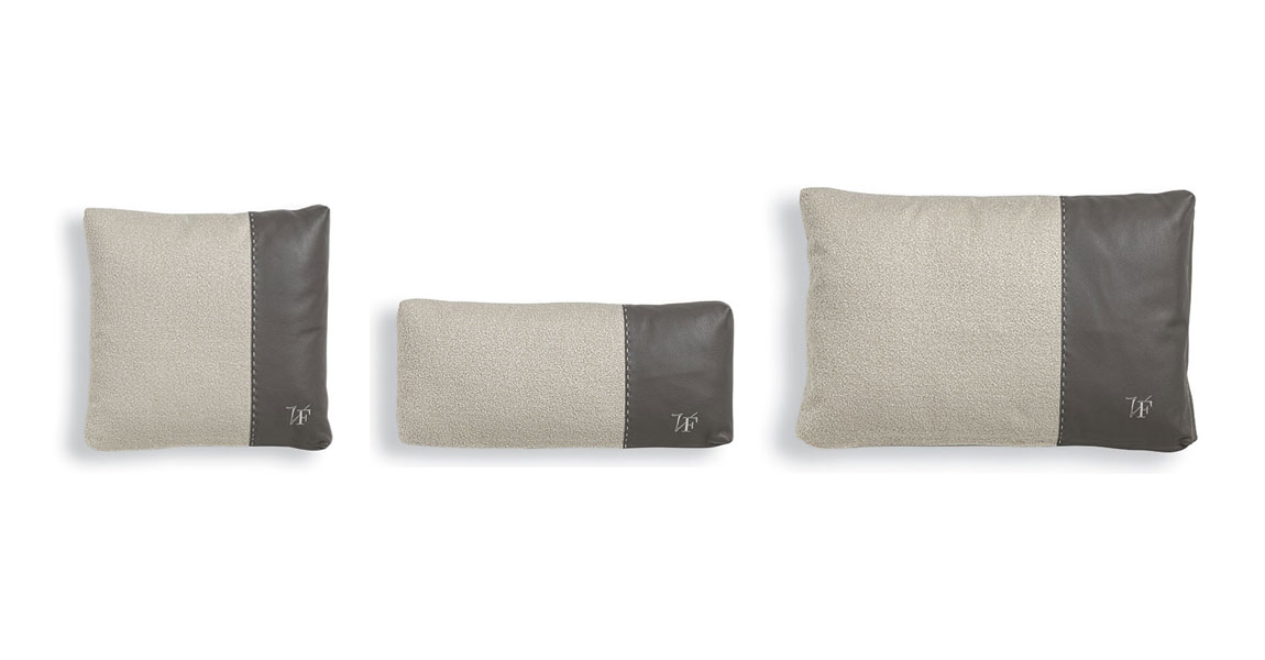 VFSPIN1 coussin design de Vittoria Frigerio, mélange élégant de tissu et cuir. Un accessoire haut de gamme disponible chez D-Style Interior.