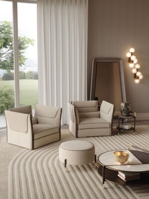 Clivio fauteuil design haut de gamme par Vittoria Frigerio, avec matelassage raffiné, boutons dorés et zip décoratif. Disponible chez D-Style Interior.