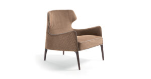 Piola Bergère fauteuil design haut de gamme par Vittoria Frigerio avec dossier aux ailes enveloppantes et capitonnage raffiné. Disponible chez D-Style Interior.