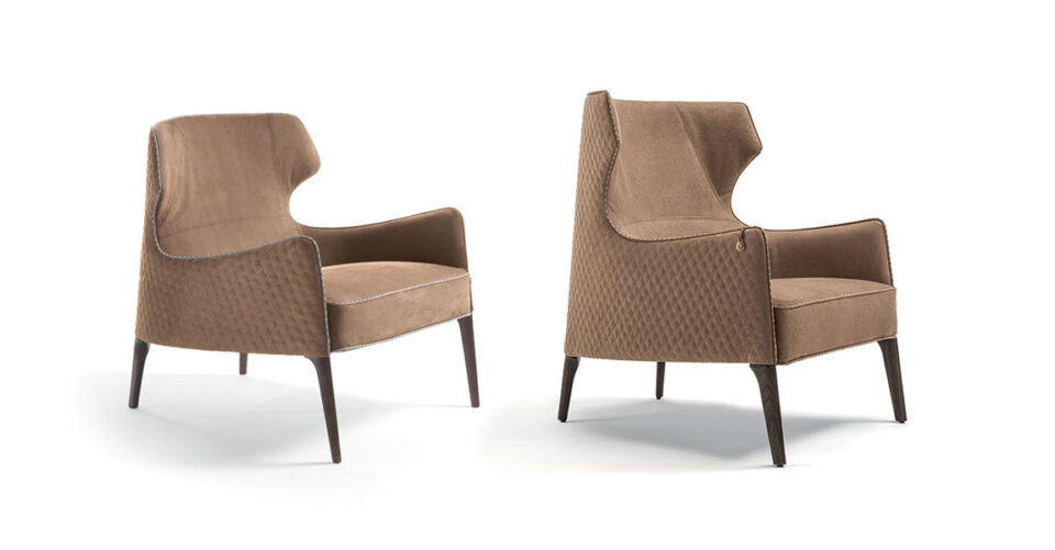 Piola Bergère fauteuil design haut de gamme par Vittoria Frigerio avec dossier aux ailes enveloppantes et capitonnage raffiné. Disponible chez D-Style Interior.