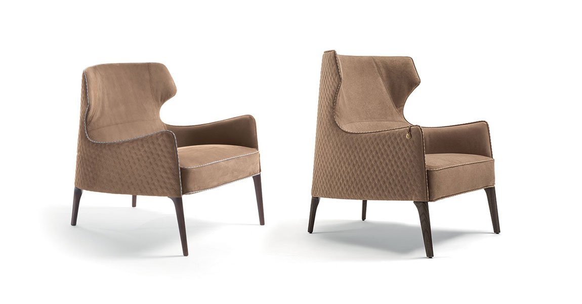 Piola Bergère fauteuil design haut de gamme par Vittoria Frigerio avec dossier aux ailes enveloppantes et capitonnage raffiné. Disponible chez D-Style Interior.