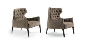 Piola Capitonné Bergère fauteuil design haut de gamme par Vittoria Frigerio avec dossier capitonné et ailes enveloppantes. Disponible chez D-Style Interior.