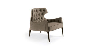 Piola Capitonné Bergère fauteuil design haut de gamme par Vittoria Frigerio avec dossier capitonné et ailes enveloppantes. Disponible chez D-Style Interior.