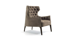 Piola Capitonné Bergère fauteuil design haut de gamme par Vittoria Frigerio avec dossier capitonné et ailes enveloppantes. Disponible chez D-Style Interior.