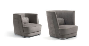 Greppi fauteuil design haut de gamme par Vittoria Frigerio avec dossier haut enveloppant et finitions luxueuses. Disponible chez D-Style Interior.