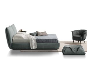 Luna fauteuil en cuir au design contemporain, inspiré des courbes lunaires, avec dossier ergonomique et détail métallique raffiné. Disponible chez D-Style Interior.