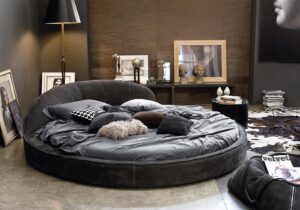 Découvrez le lit Jazz Night, un lit en cuir avec design circulaire et coutures raffinées. Disponible chez D-Style Interior.