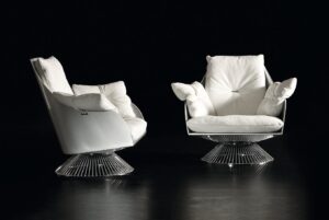 Gloss fauteuil design haut de gamme par Gamma Arredamenti avec détails raffinés, assise moelleuse et base métallique élégante. Disponible chez D-Style Interior.