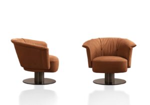 Luna fauteuil en cuir au design contemporain, inspiré des courbes lunaires, avec dossier ergonomique et détail métallique raffiné. Disponible chez D-Style Interior.
