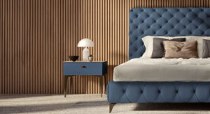 Aston Alto Night lit de Gamma Arredamenti se distingue par son capitonnage artisanal et sa tête de lit basse. Disponible chez D-Style Interior.