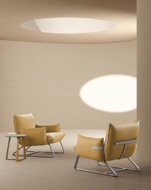 Fifty table basse design de Gamma Arredamenti allie élégance et modernité avec sa base en métal croisé et son détail en cuir. disponible chez D-Style Interior.