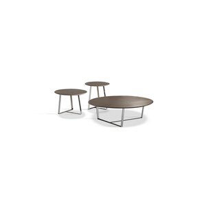 Moon table basse de Gamma Arredamenti incarne un design minimaliste et raffiné, avec des finitions en marbre et céramique. disponible chez D-Style Interior.